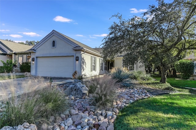 ranch-style house featuring a garage