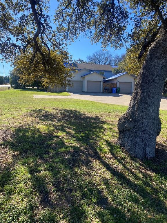 view of yard with a garage