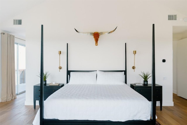 bedroom featuring light hardwood / wood-style floors