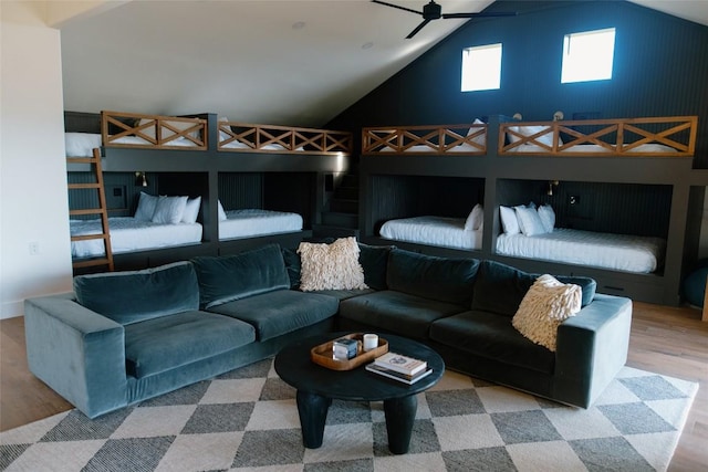 bedroom featuring hardwood / wood-style floors and vaulted ceiling