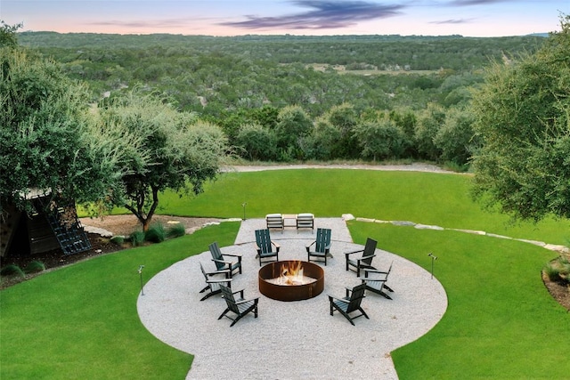 exterior space with a fire pit