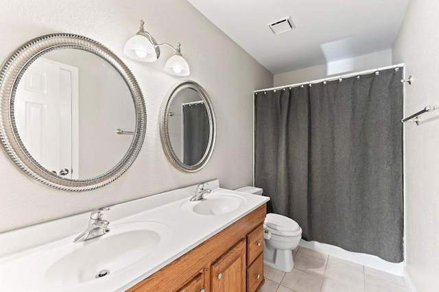 1807 Iris Ln, Cedar Park, TX 78613 - bathroom with toilet, double vanity, tile patterned floors, and a shower with shower curtain