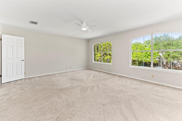 1807 Iris Ln, Cedar Park, TX 78613 - carpeted empty room featuring a ceiling fan and baseboards
