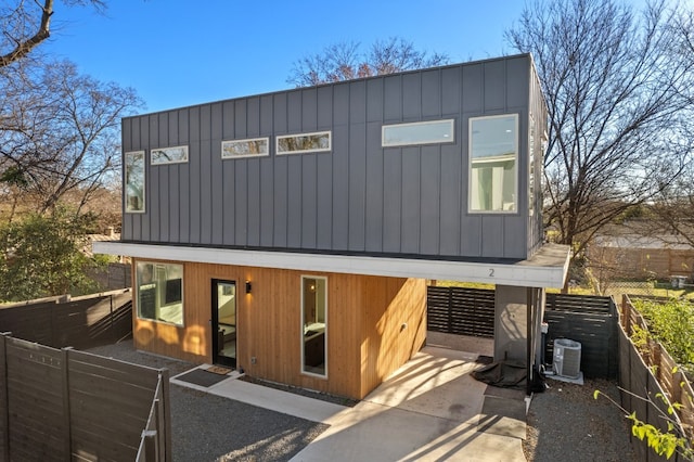 view of front of house featuring central AC