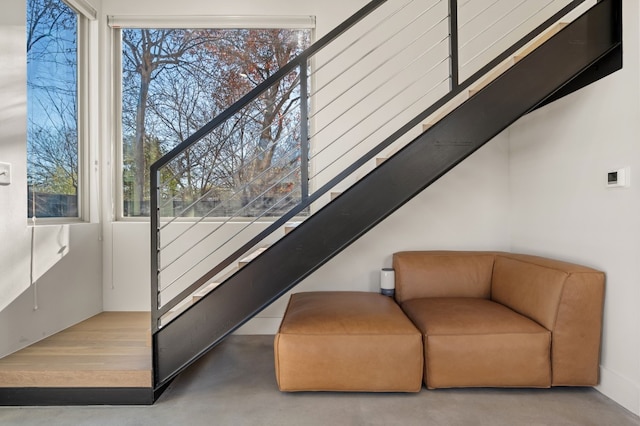 409 W Odell St Unit 2, Austin, TX 78752 - staircase featuring finished concrete flooring