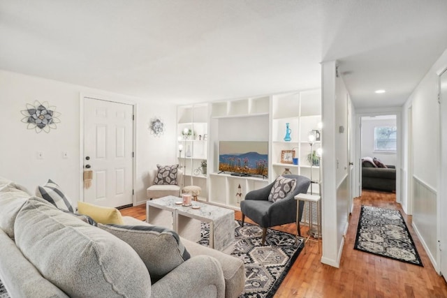 living room with light hardwood / wood-style flooring