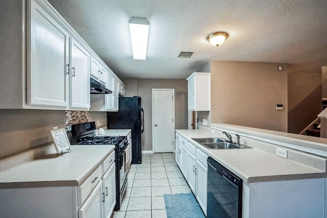 kitchen featuring white cabinets, light tile patterned floors, sink, and black appliances