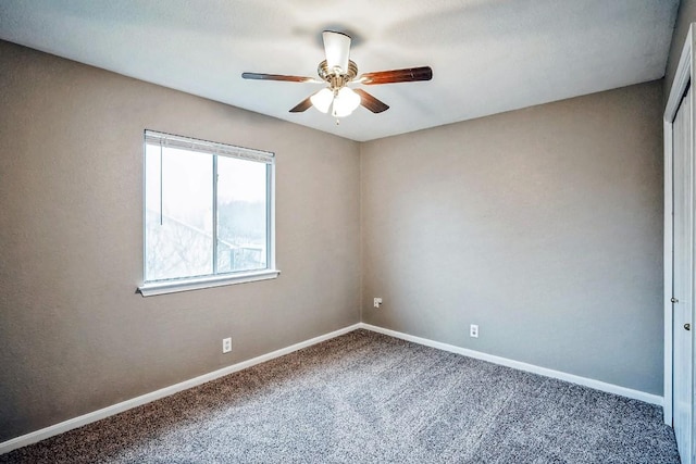 empty room with carpet flooring