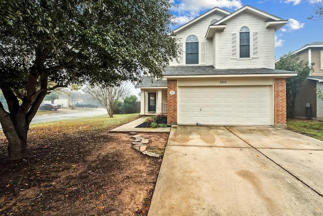 view of front of property with a garage