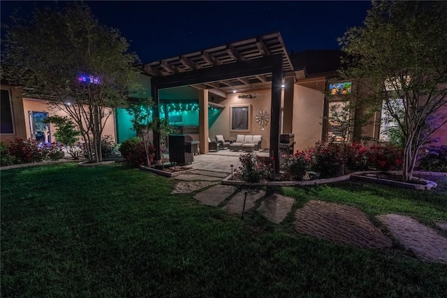 exterior space featuring a patio area, an outdoor hangout area, and a pergola