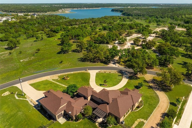 bird's eye view featuring a water view and a wooded view