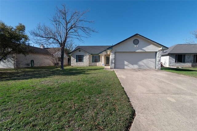 ranch-style house with a front yard and a garage