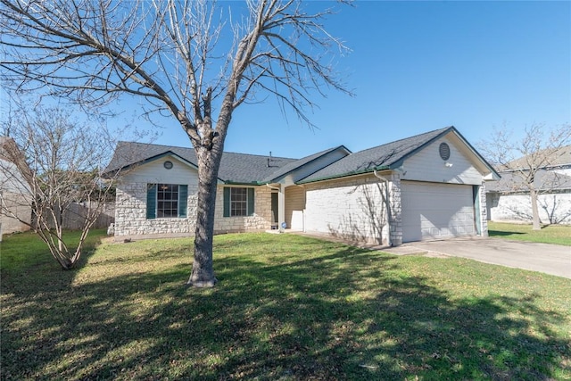 ranch-style house featuring a front yard and a garage