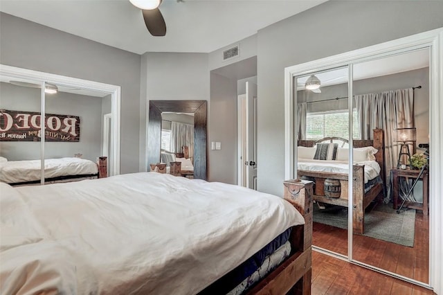 bedroom with a closet, dark hardwood / wood-style floors, and ceiling fan