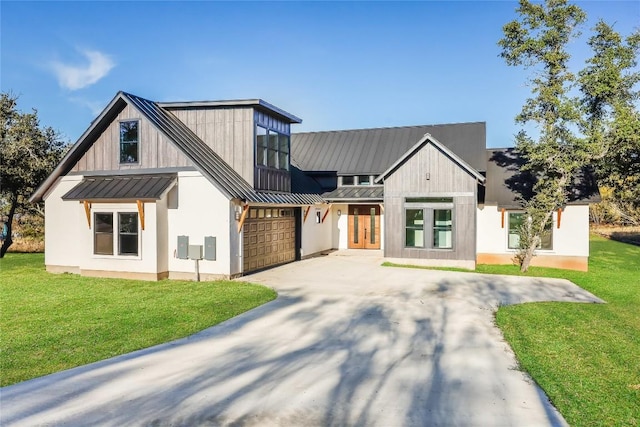 modern farmhouse style home featuring a front yard