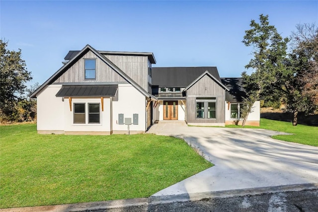 modern farmhouse with a front yard