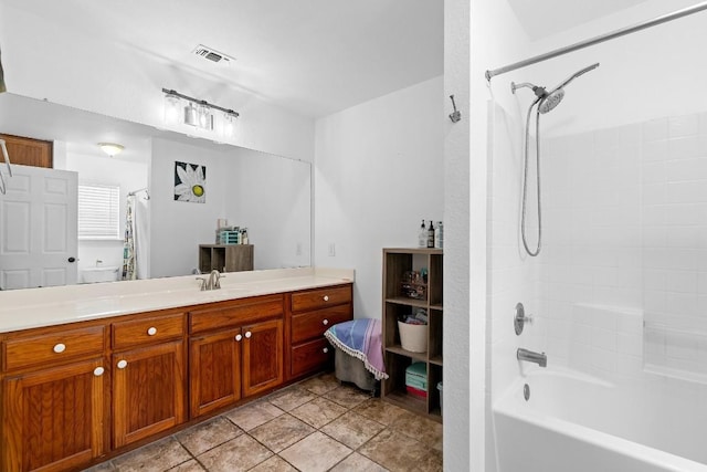 bathroom with vanity and shower / bath combination