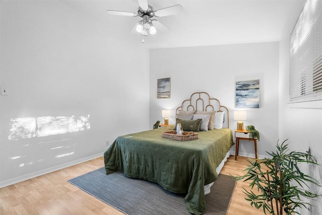 bedroom featuring wood-type flooring and ceiling fan