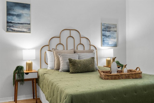 bedroom featuring hardwood / wood-style floors