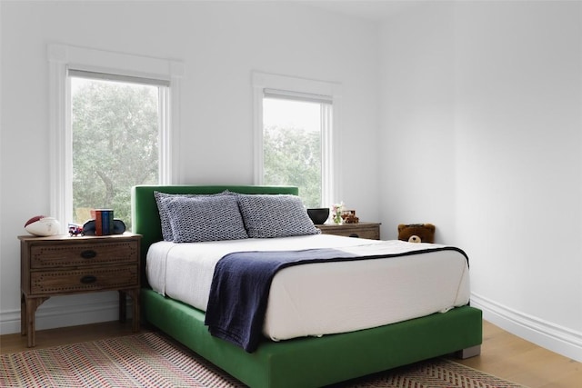 bedroom featuring hardwood / wood-style floors