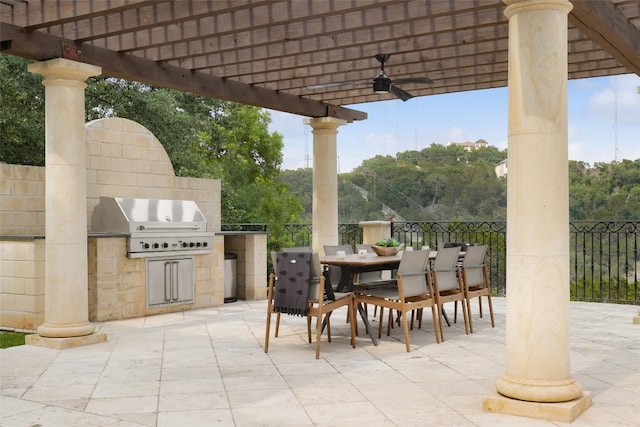 view of patio featuring a pergola, area for grilling, ceiling fan, and a grill