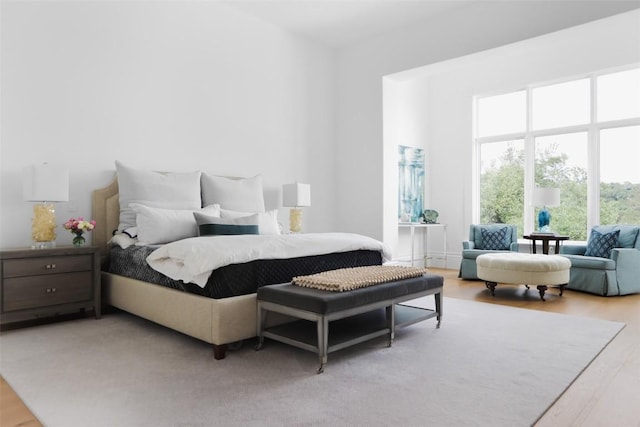 bedroom with hardwood / wood-style flooring