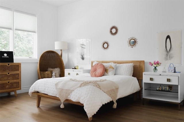 bedroom featuring wood-type flooring