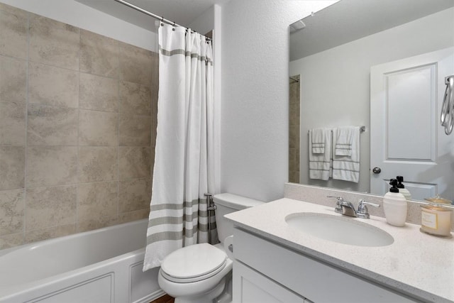 full bathroom with toilet, vanity, and shower / tub combo with curtain