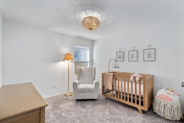 carpeted bedroom with a crib