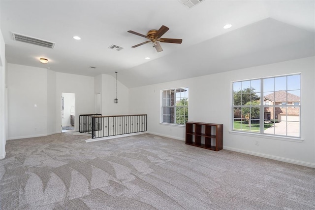 interior space featuring ceiling fan and lofted ceiling