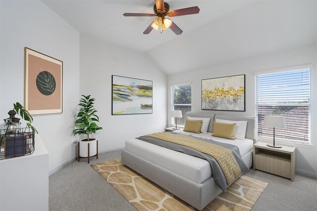 bedroom with light carpet, ceiling fan, and lofted ceiling