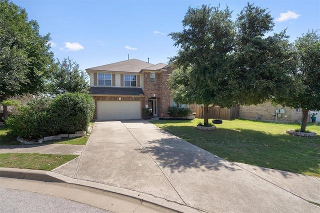 view of front of house with a front lawn and a garage