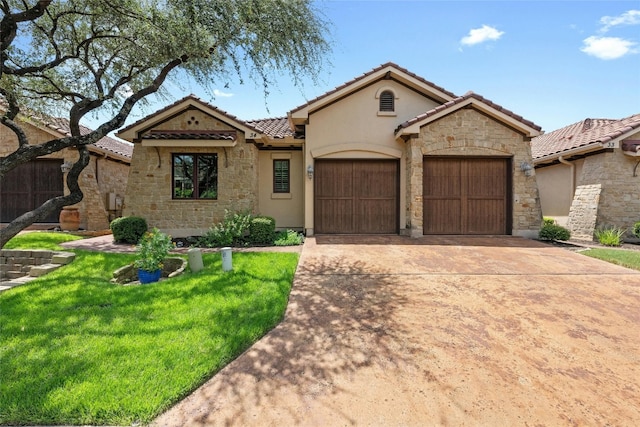 mediterranean / spanish-style home with a front yard and a garage