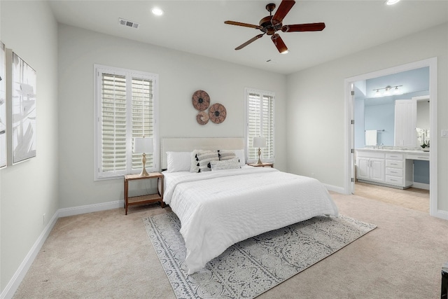 bedroom with light carpet, baseboards, and recessed lighting