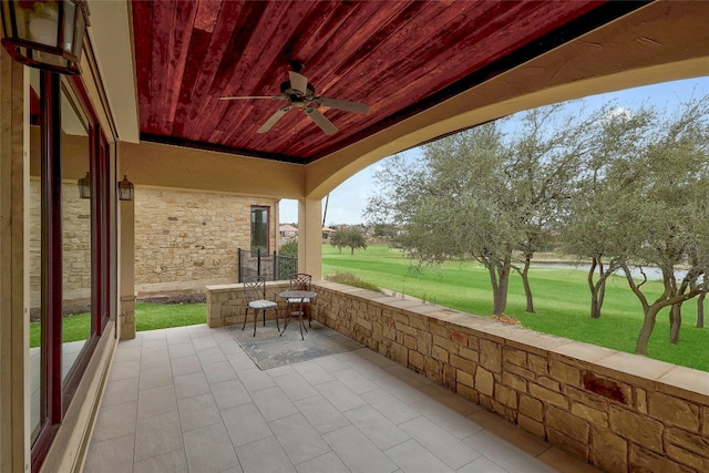 view of patio featuring a ceiling fan