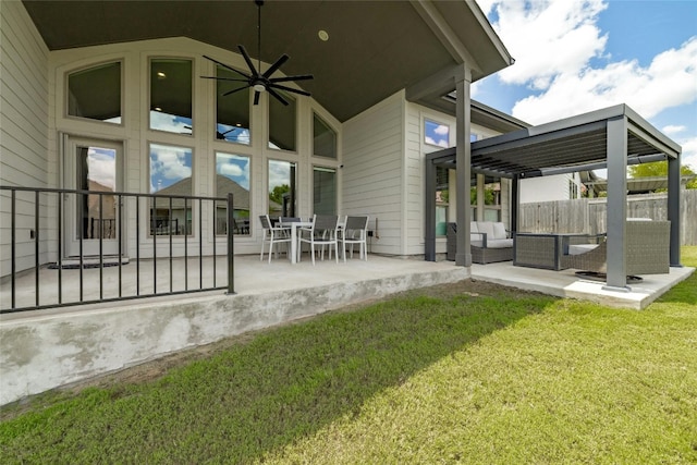 exterior space with an outdoor living space, a lawn, and a patio