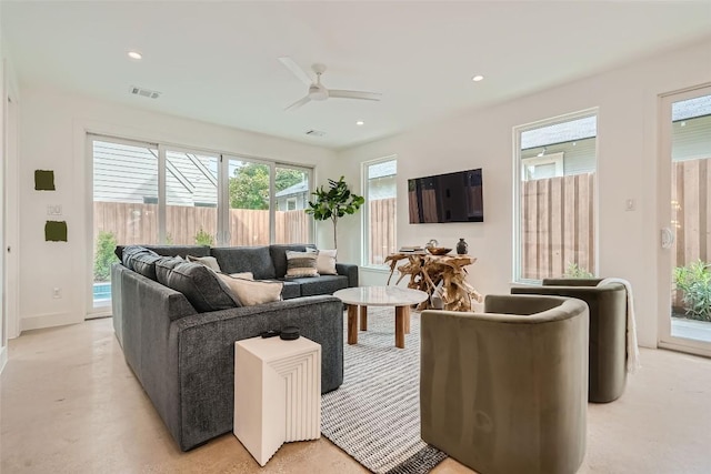 living room featuring ceiling fan