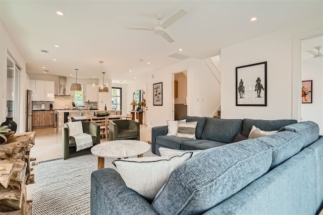 living room featuring ceiling fan