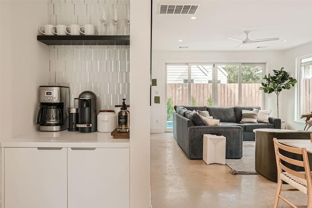 living room featuring ceiling fan