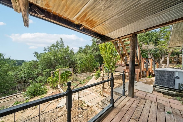 wooden terrace featuring central AC