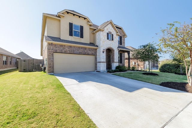 view of front of home with a garage, central air condition unit, and a front yard