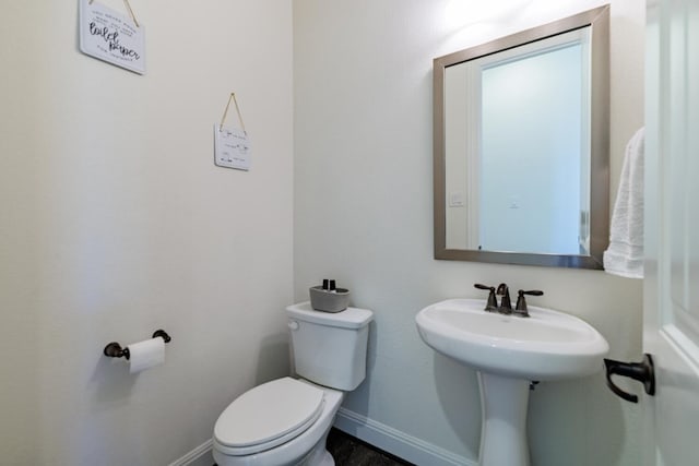 bathroom featuring toilet