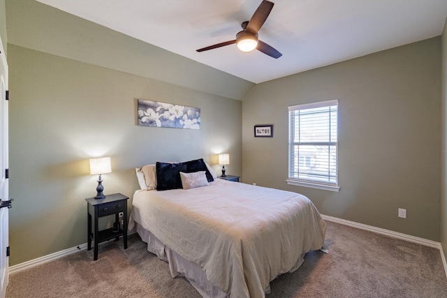 bedroom featuring ceiling fan, light carpet, and vaulted ceiling