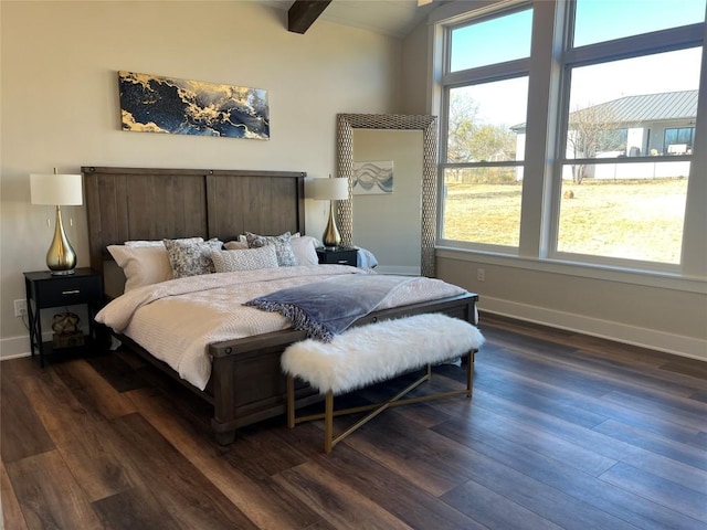 bedroom with lofted ceiling with beams and dark wood-type flooring