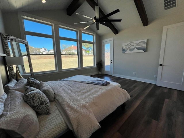 bedroom with ceiling fan, lofted ceiling with beams, dark hardwood / wood-style flooring, and multiple windows