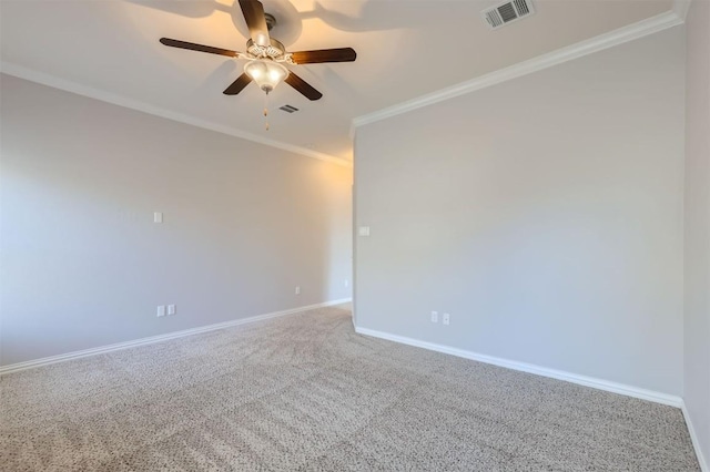 unfurnished room featuring ceiling fan, carpet, and ornamental molding