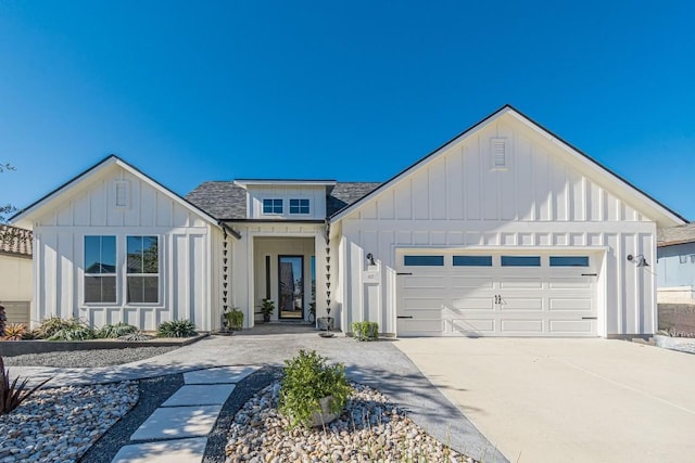 modern farmhouse featuring a garage