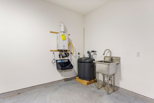 laundry area with sink and water heater