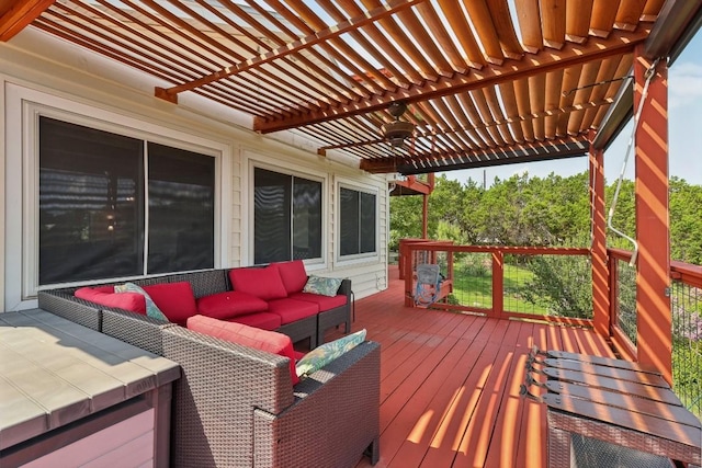 wooden deck featuring outdoor lounge area and a pergola