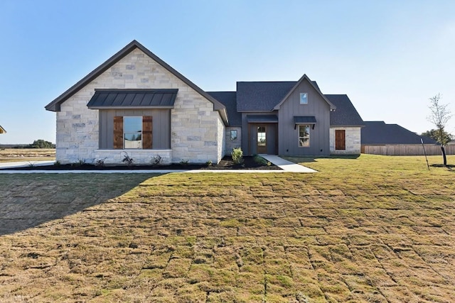 modern farmhouse with a front yard